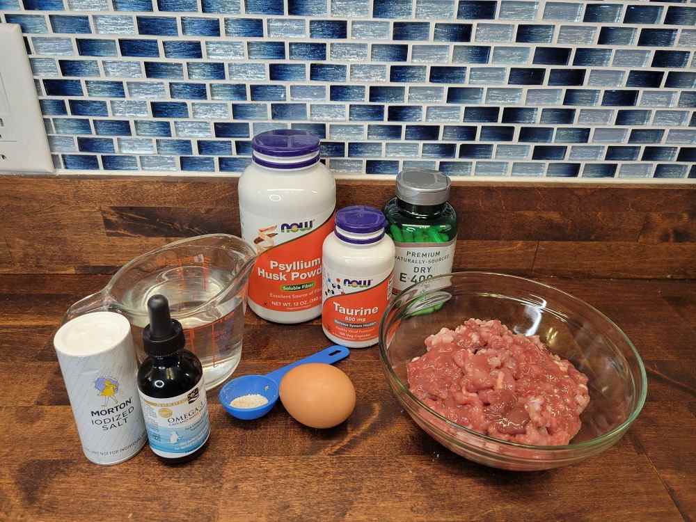 Ground Chicken Thigh with Bone and Organs Recipe (from Feline Nutrition Foundation)